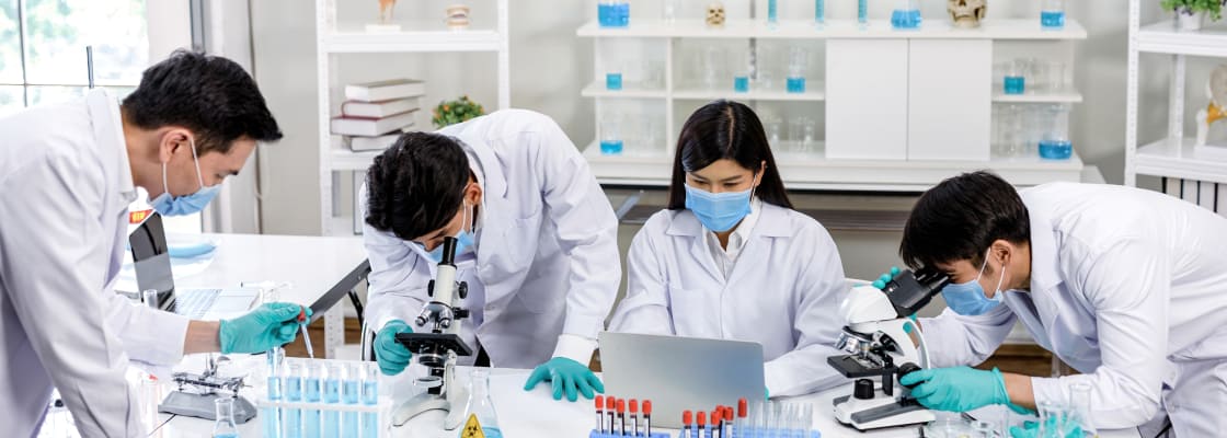 Four medical researchers working in a lab.